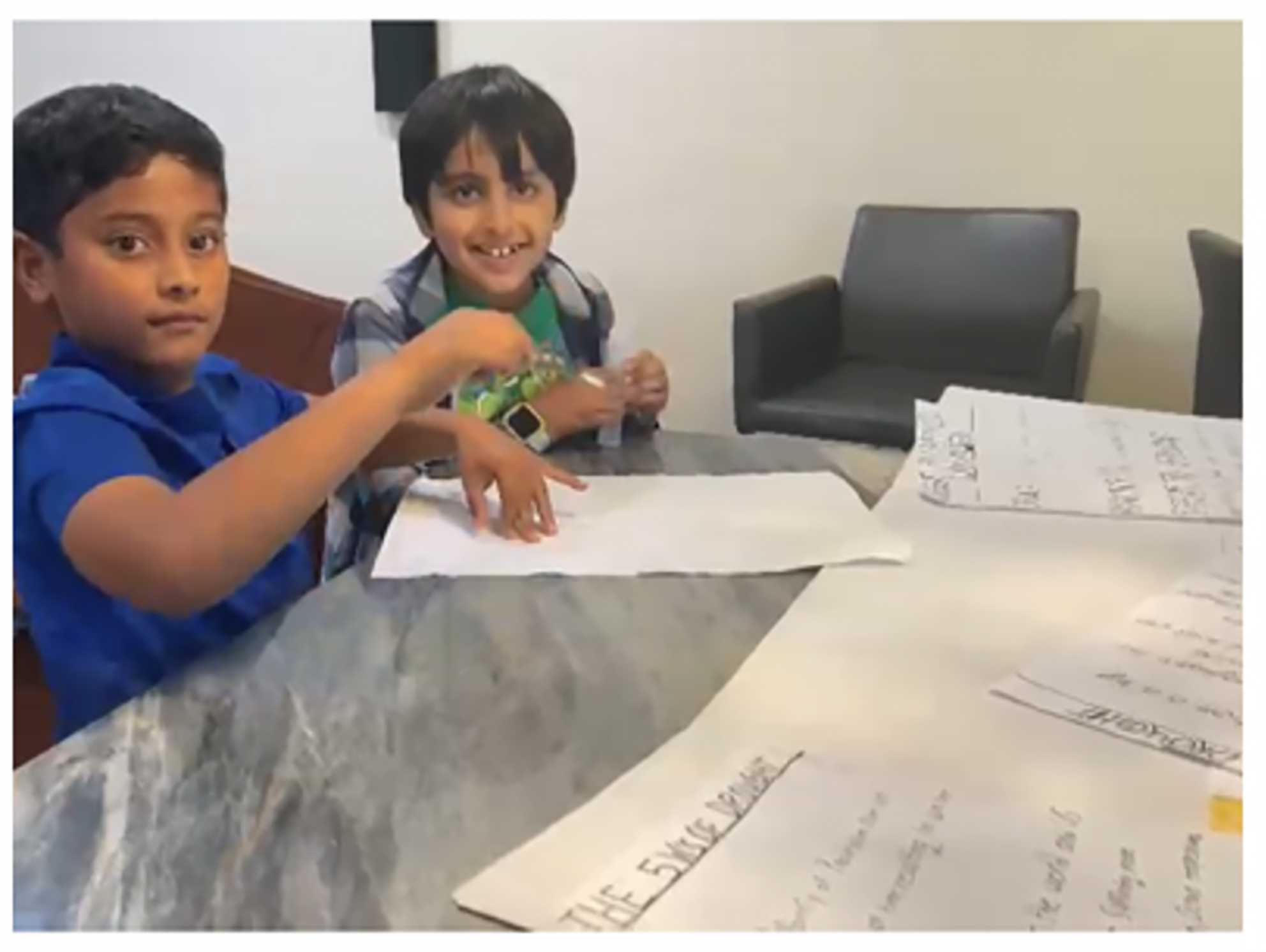 Yash and Ishaan working on science project