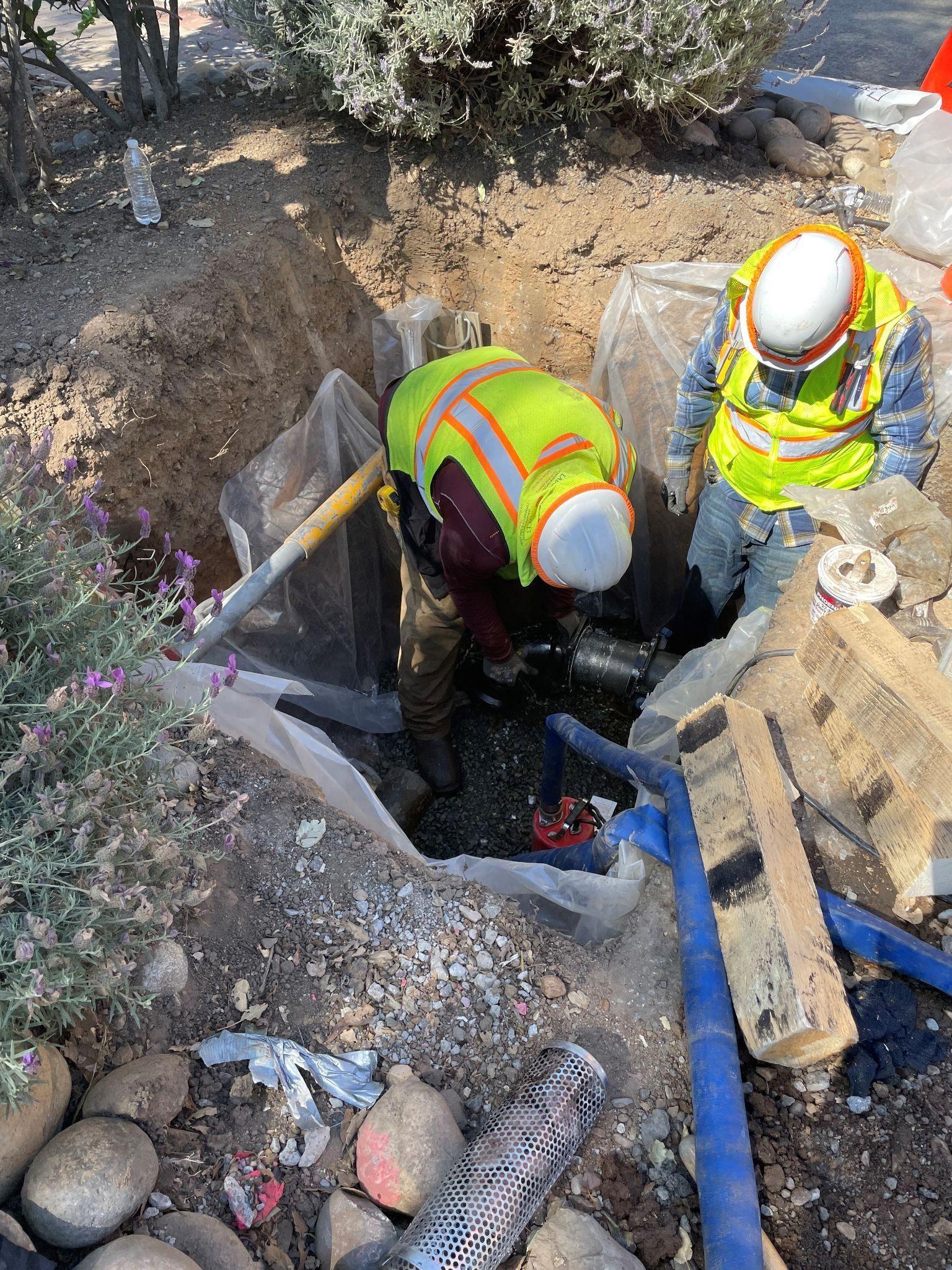 San Jose Water employees working on a water pipe