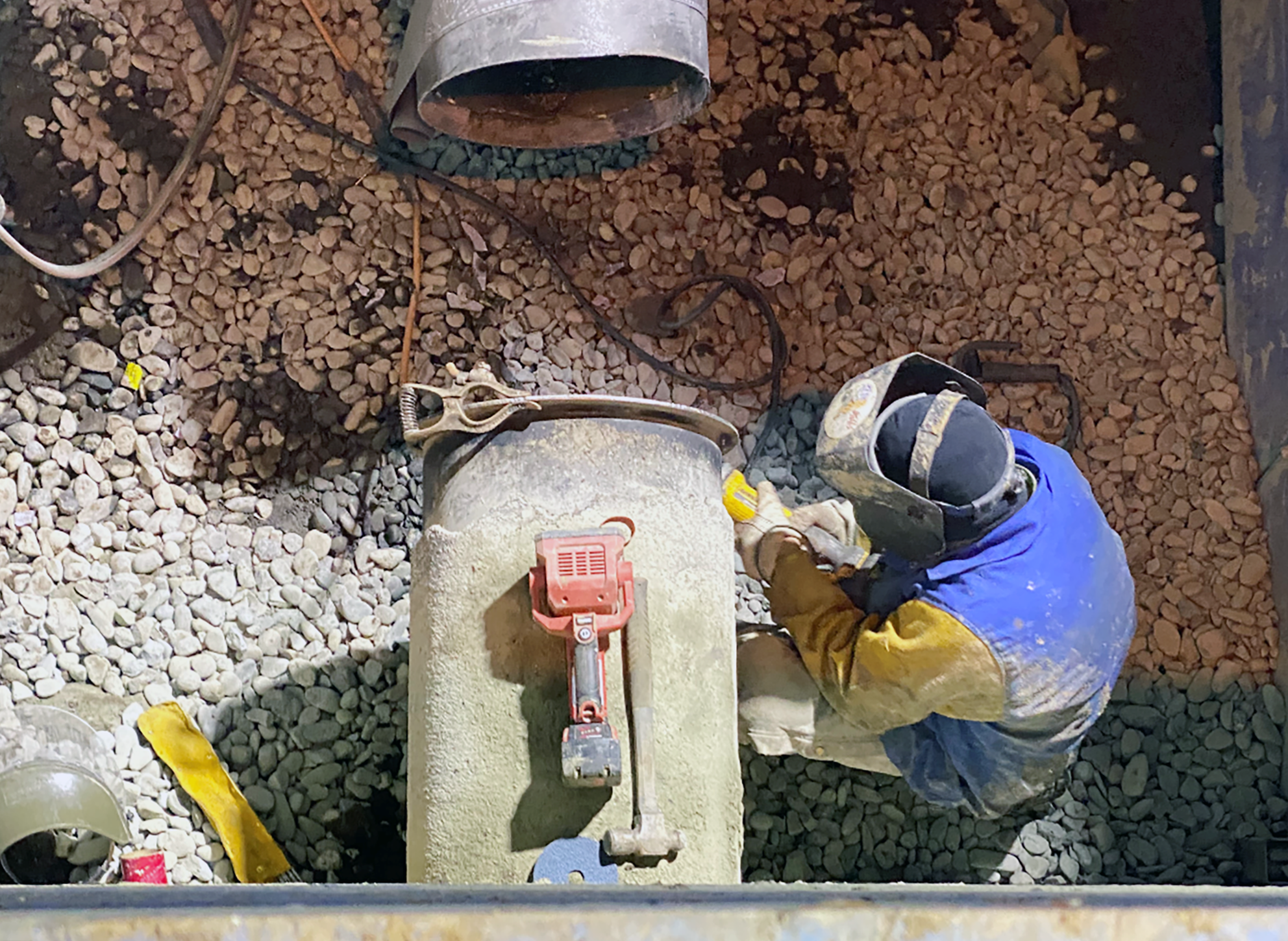 San Jose Water employee working on a pipe