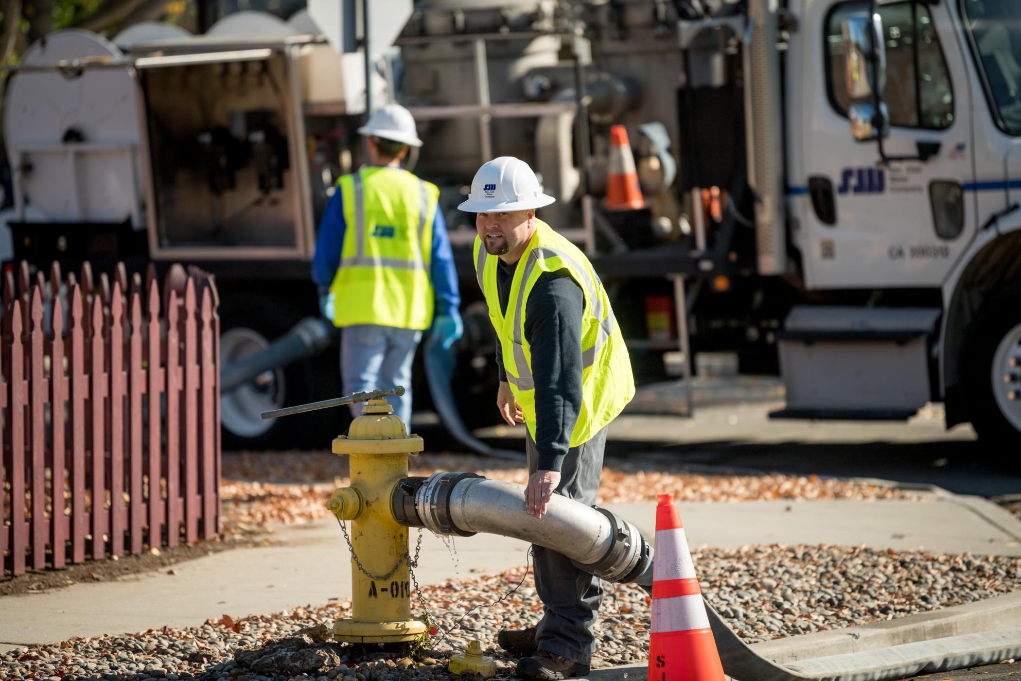San Jose Water employee flushing a hydrant