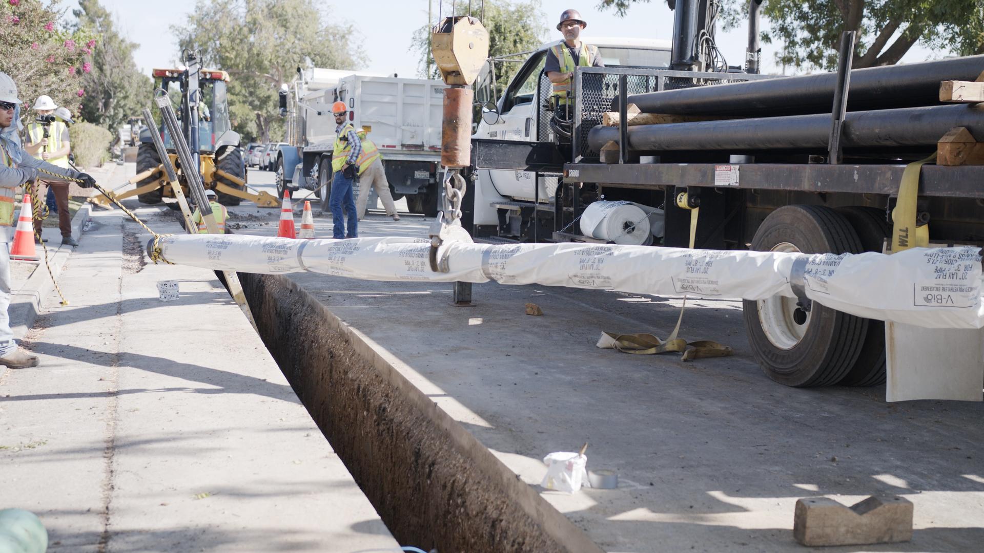 San Jose Water employees working on a water pipe