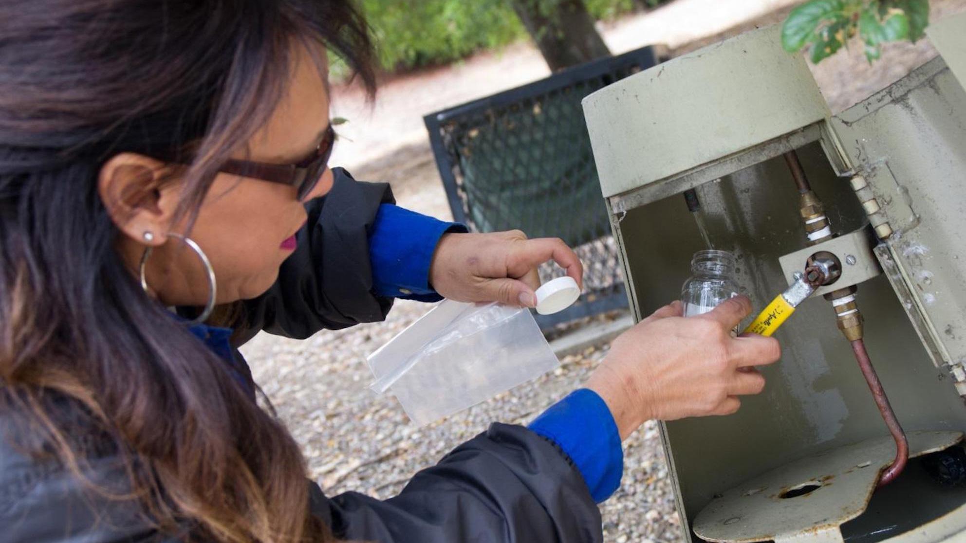 San Jose Water employee testing water