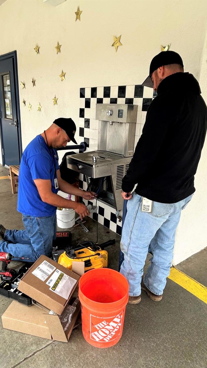 San Jose Water working on a water fountain 