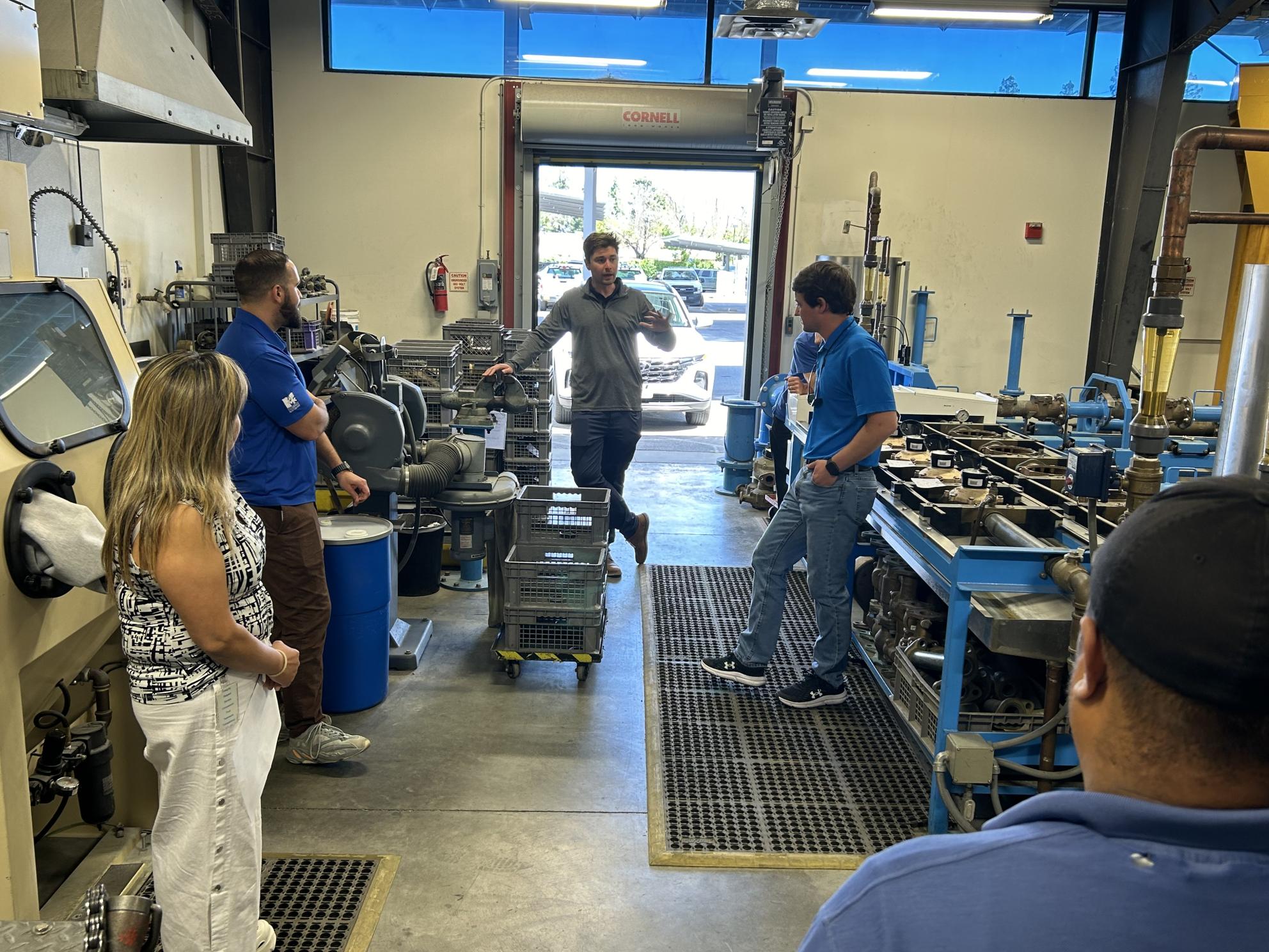 people in the meter shop