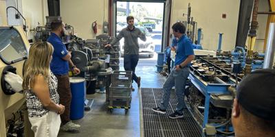 people in the meter shop