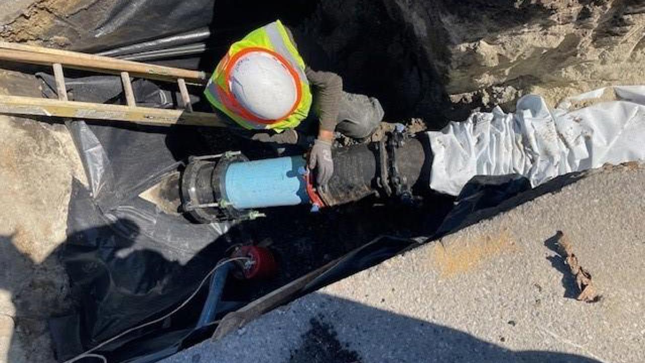 San Jose Water employee working on a pipe